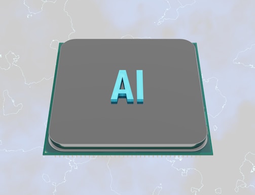 A grey processor chip with the letters 'AI' prominently displayed in blue, set against a subtle background with faint outlines of a map.